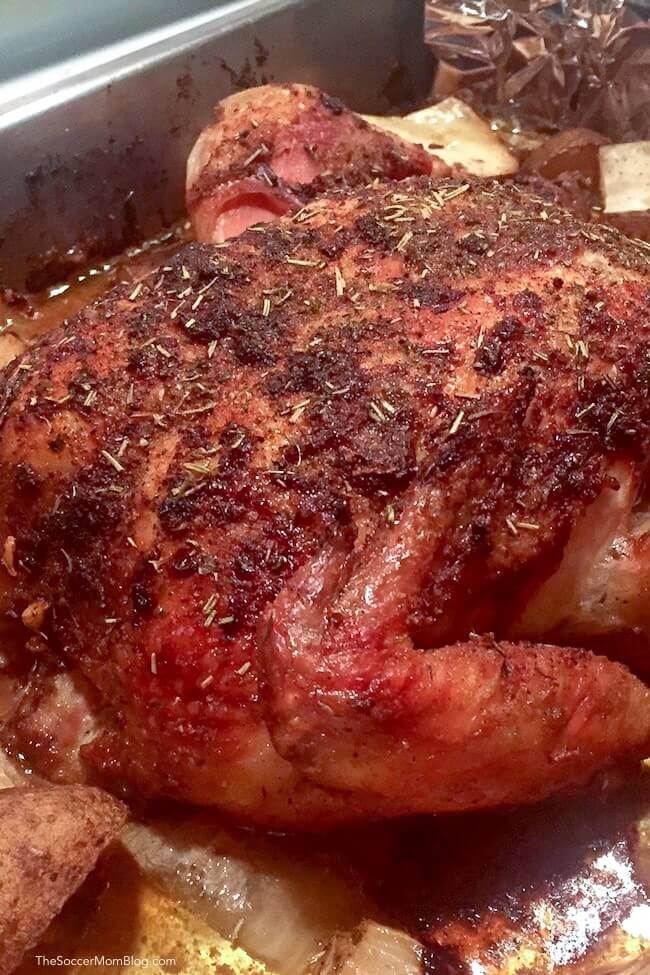 close-up of a seasoned rotisserie chicken.
