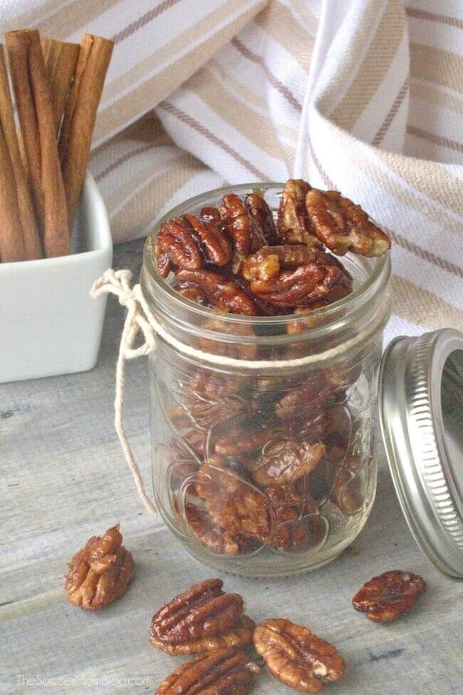 mason jar filled with candied pecans.