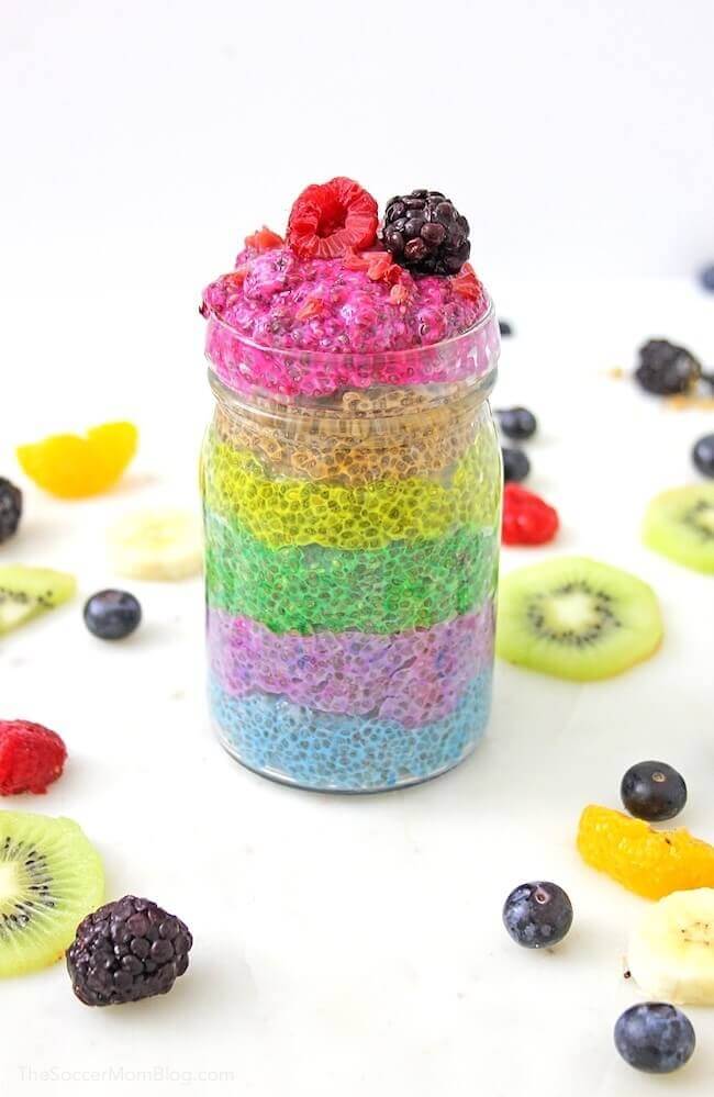chia seed pudding layered with rainbow colors in mason jar.