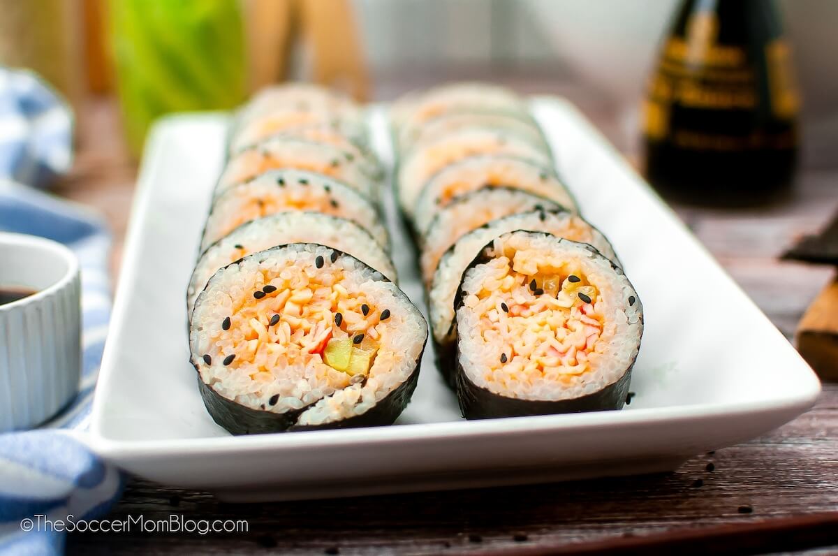 Spicy Crab Sushi on plate, close up to show the front two pieces in detail.