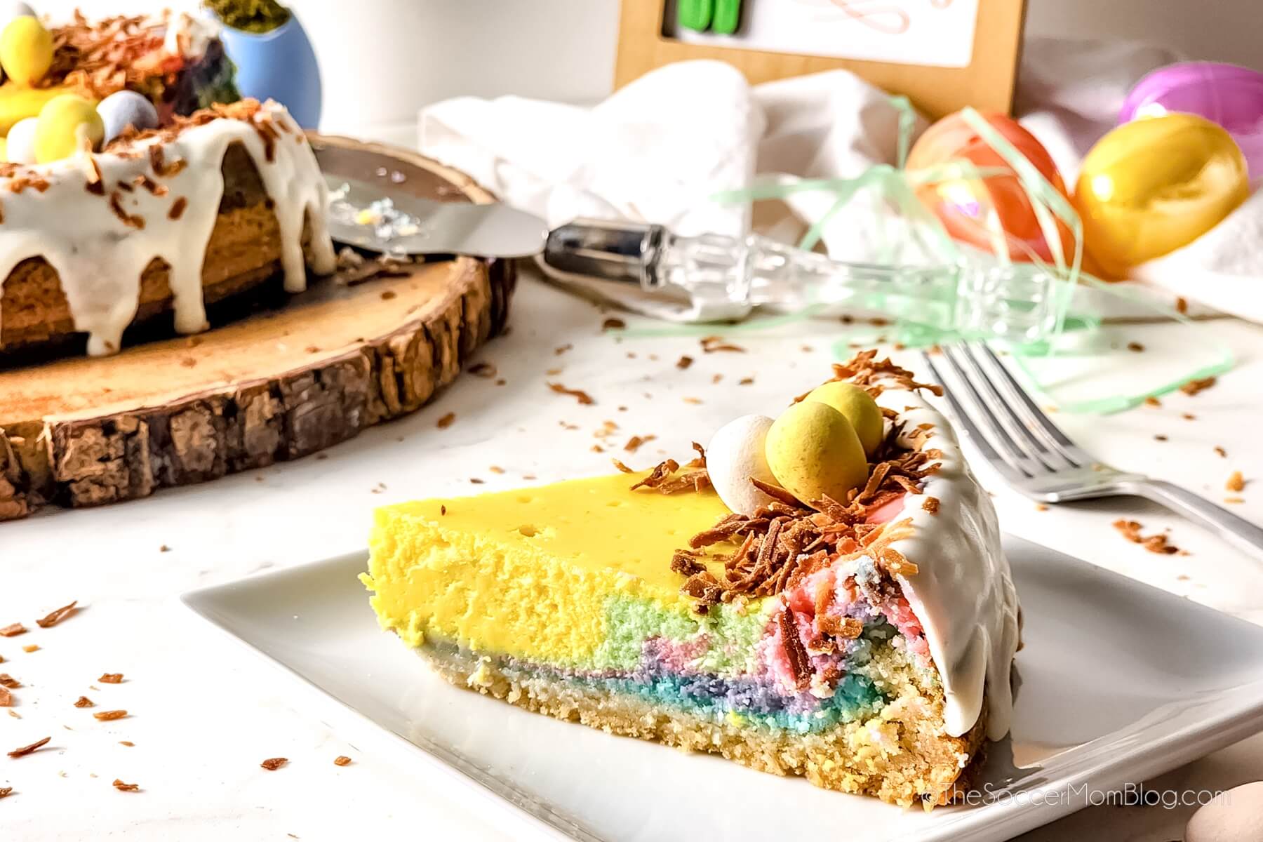 slice of rainbow swirled cheesecake.