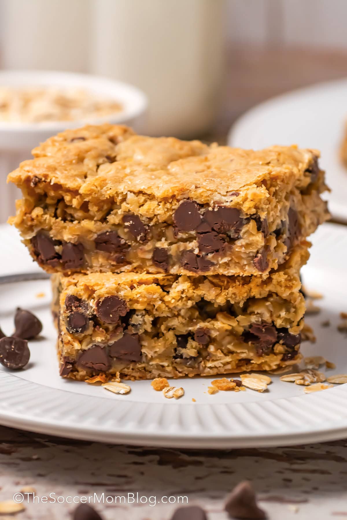 A pile of Chocolate Chip Oatmeal Bars on a plate.