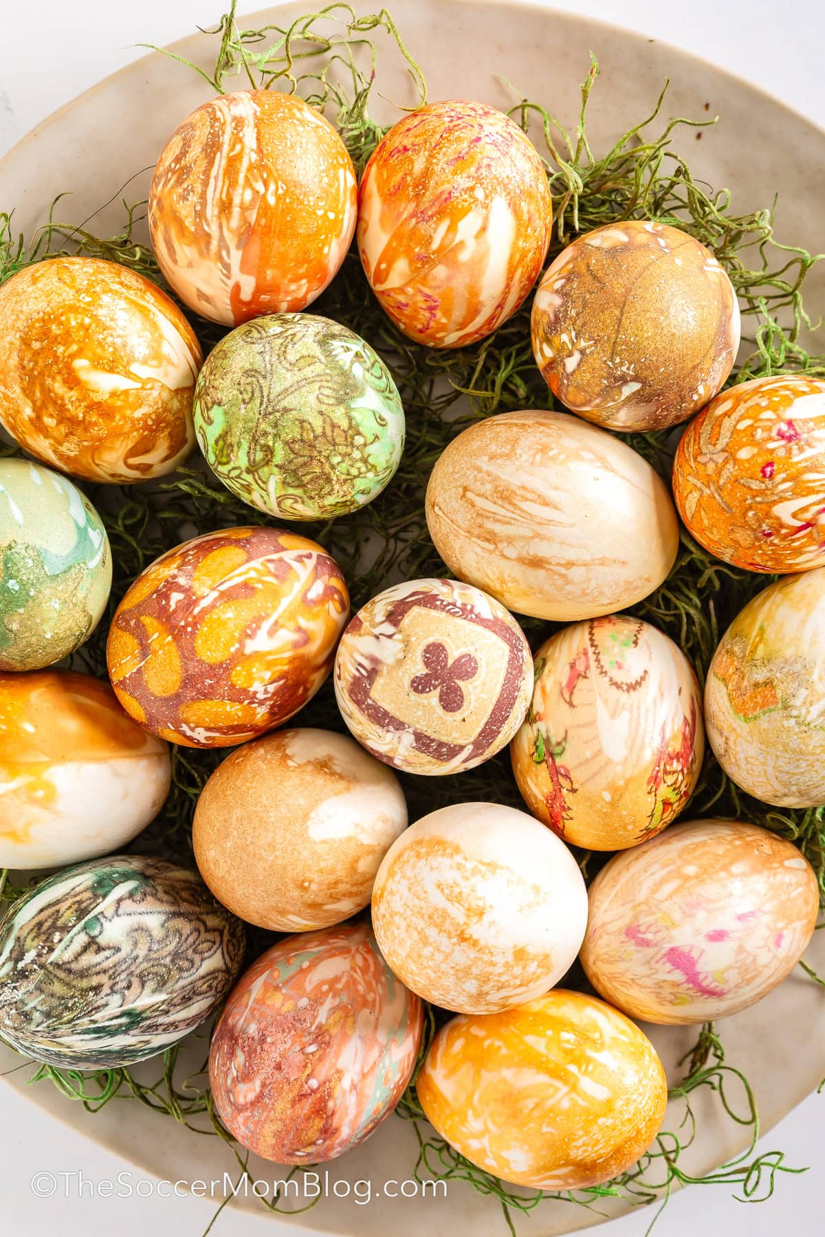 a bowl of rustic patterned silk-dyed Easter eggs.