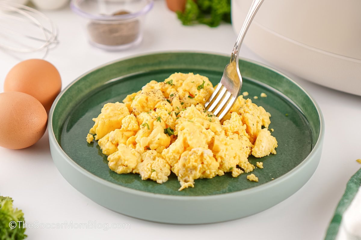 A plate of fluffy crockpot scrambled eggs.