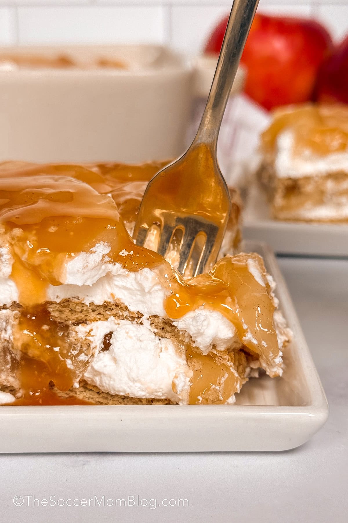 taking a bite of apple icebox cake.
