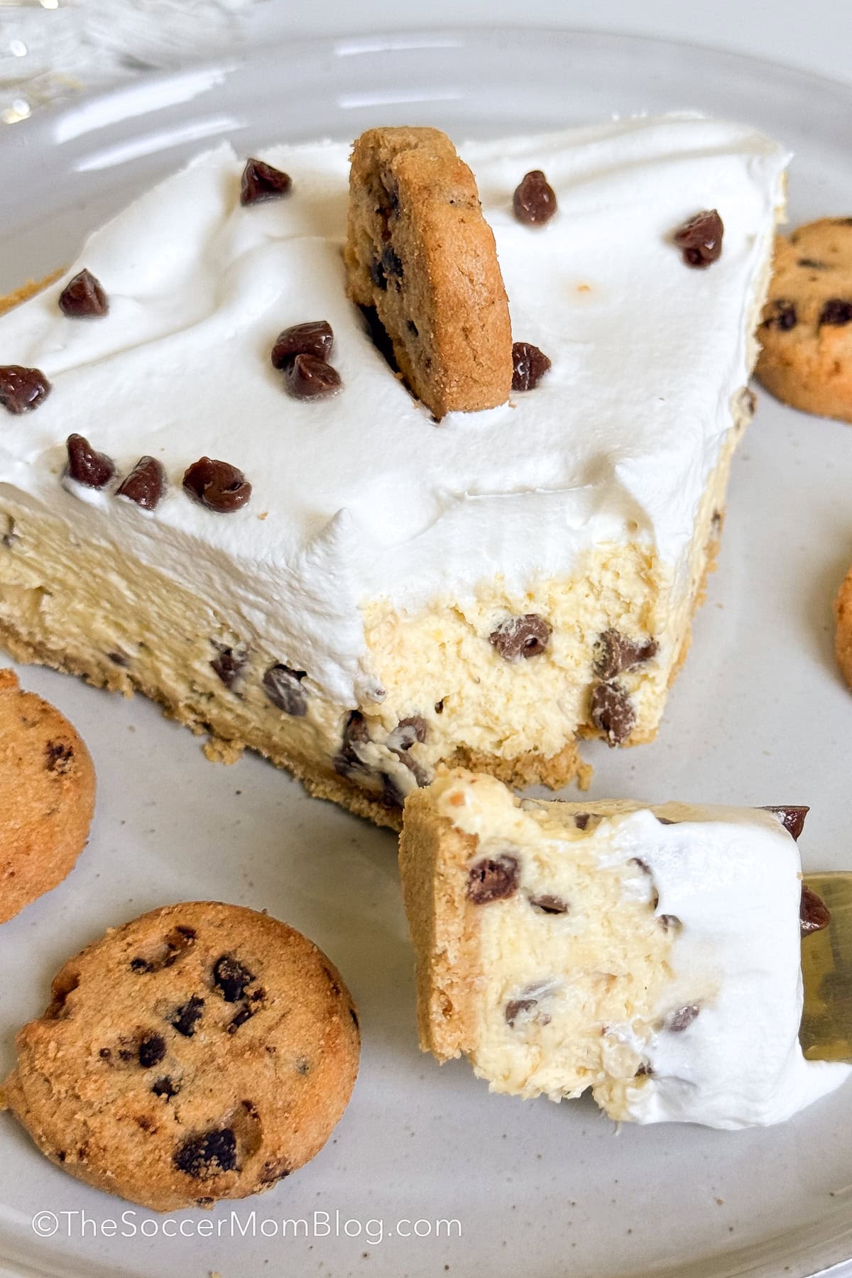 a slice of no bake cookie dough pie with a bite taken.