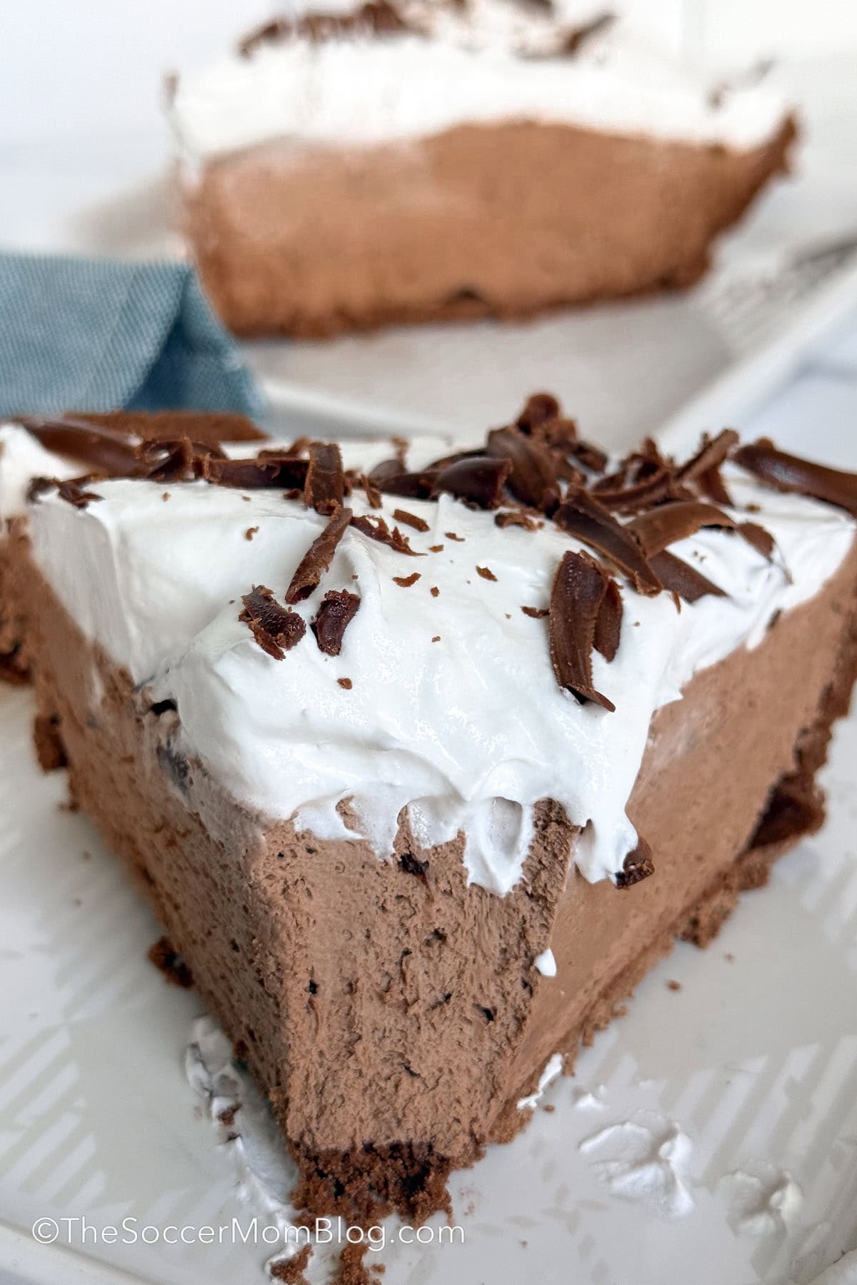 chocolate pie slice with a bite missing.