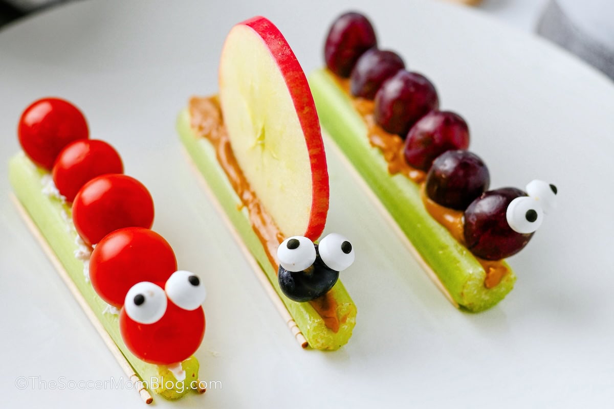 close up of bug-themed snacks made with celery and fruit.
