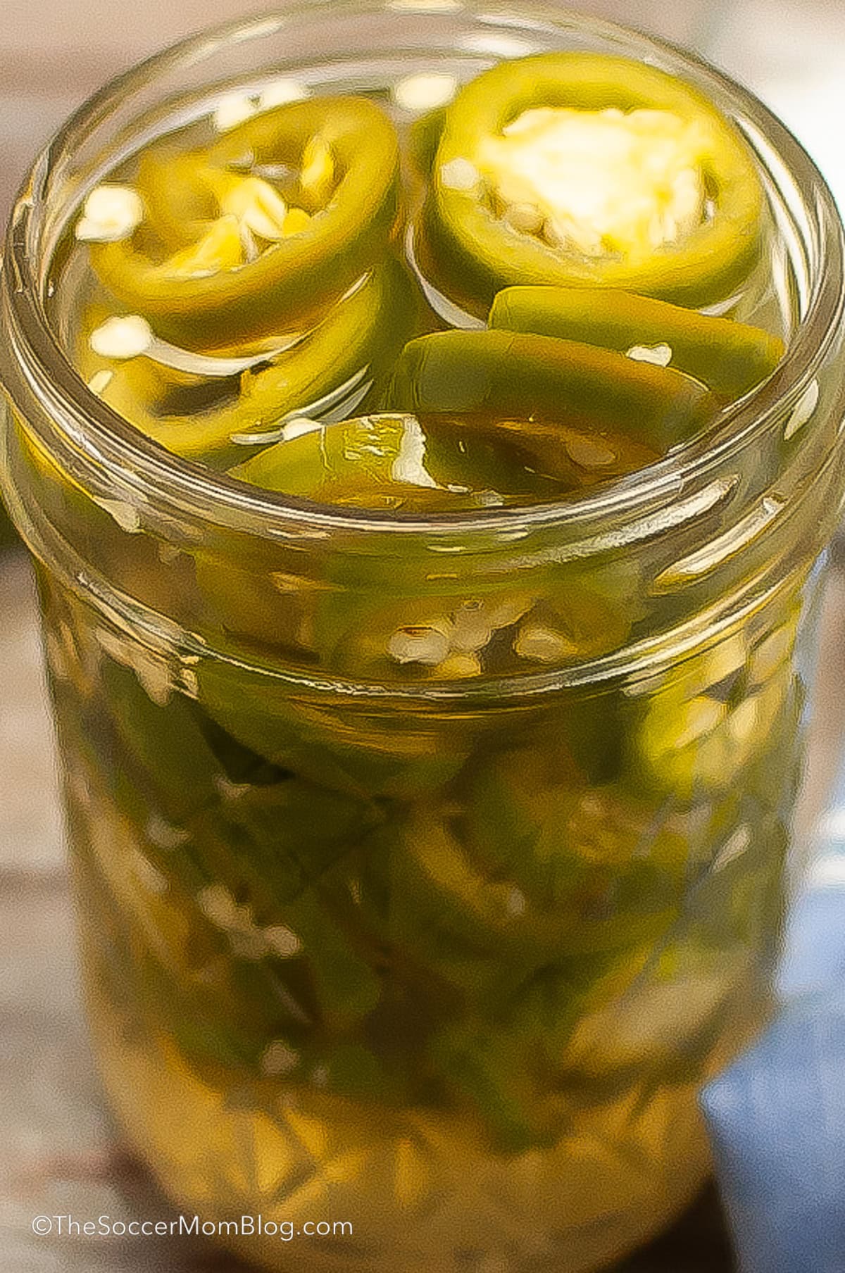open jar of pickled jalapeños.