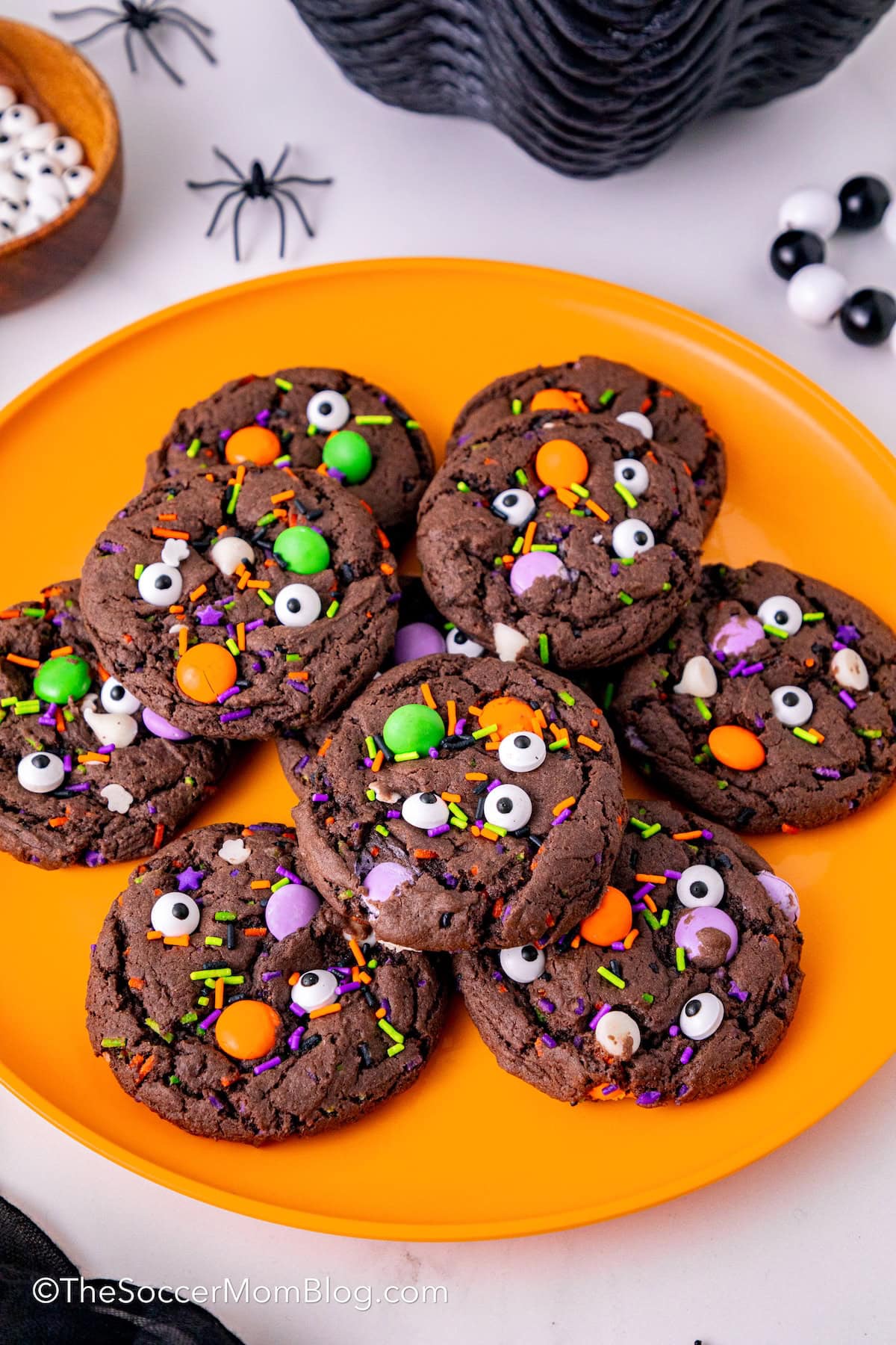 A pile of Chocolate Halloween Monster Cookies.